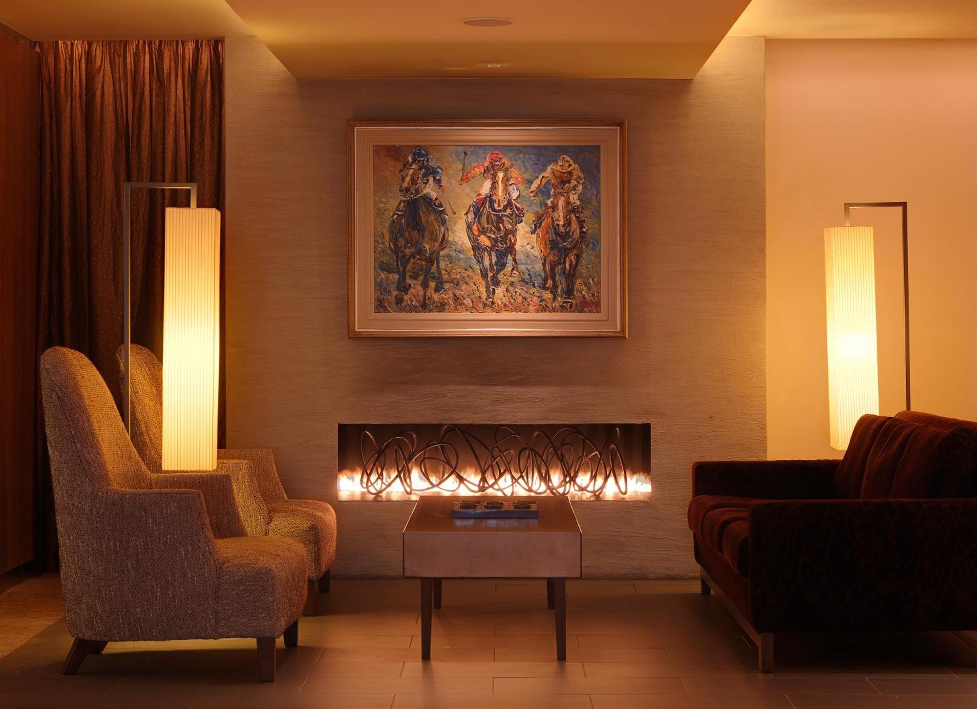 Aghadoe Heights Hotel & Spa 킬라니 내부 사진 A fireplace in a living room